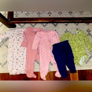 Baby girl clothes size 9 months.